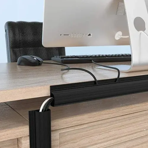 Cables hidden behind a desk