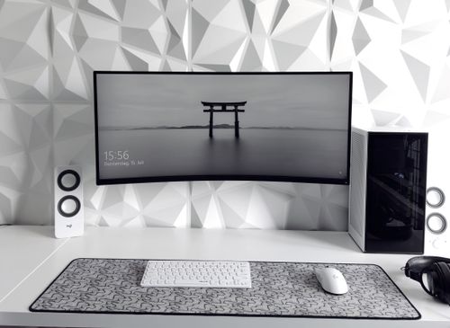 Stunning Small White Monochromatic Workstation With Textured Wall